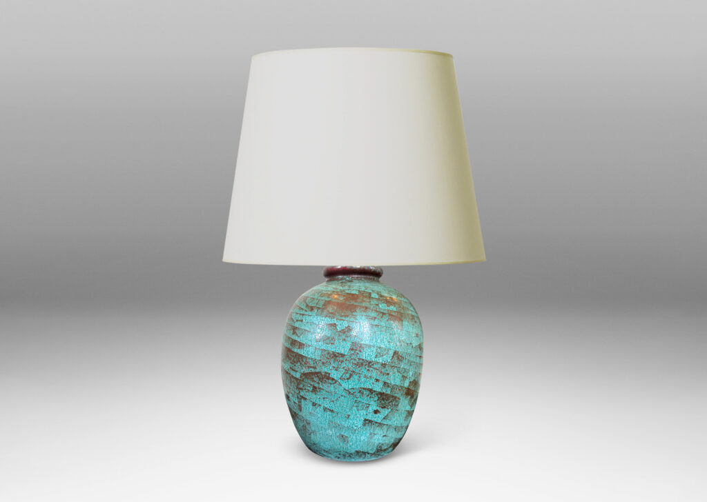 Gallery BAC ovoid form glazed in a marvelous celadon green-red luster with spiraling craquelure