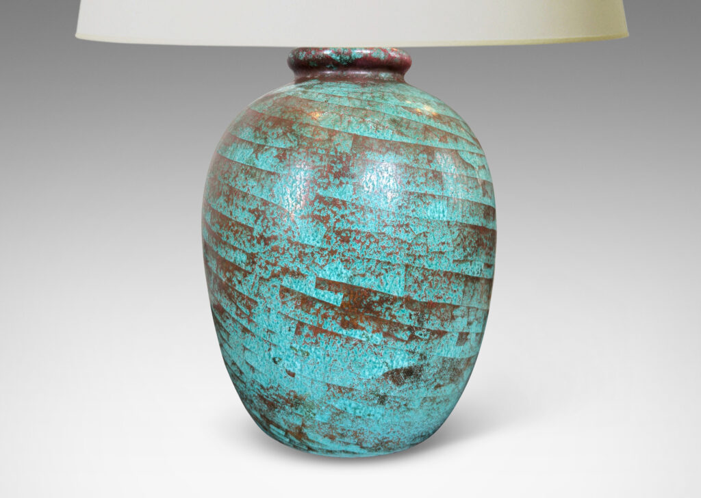 Gallery BAC ovoid form glazed in a marvelous celadon green-red luster with spiraling craquelure