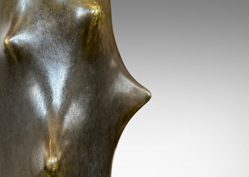 Gallery BAC cylindrical form with high relief “thorn” projections, glazed in a dark jungle green