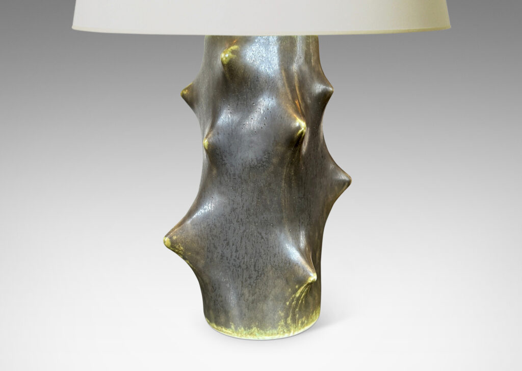 Gallery BAC cylindrical form with high relief “thorn” projections, glazed in a dark jungle green