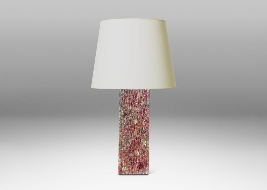 Gallery BAC square pillar forms with carved surface texture in red and gray marble, with cylindrical necks in white marble