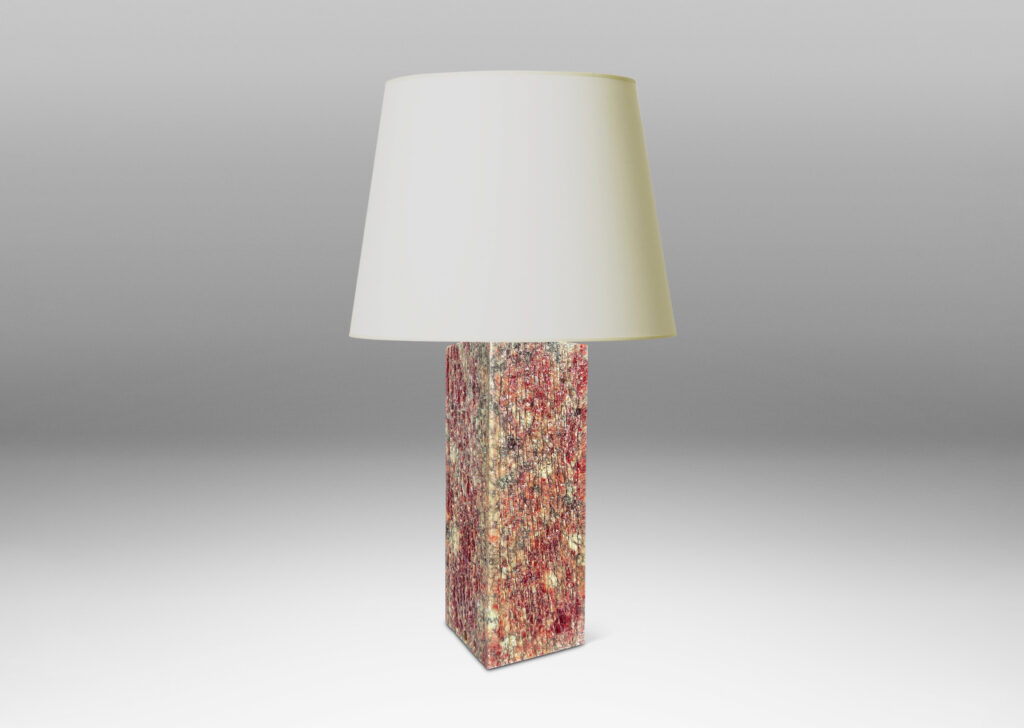 Gallery BAC square pillar forms with carved surface texture in red and gray marble, with cylindrical necks in white marble