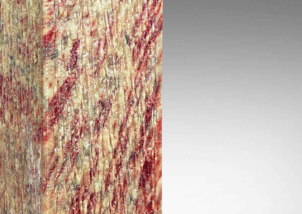 Gallery BAC square pillar forms with carved surface texture in red and gray marble, with cylindrical necks in white marble