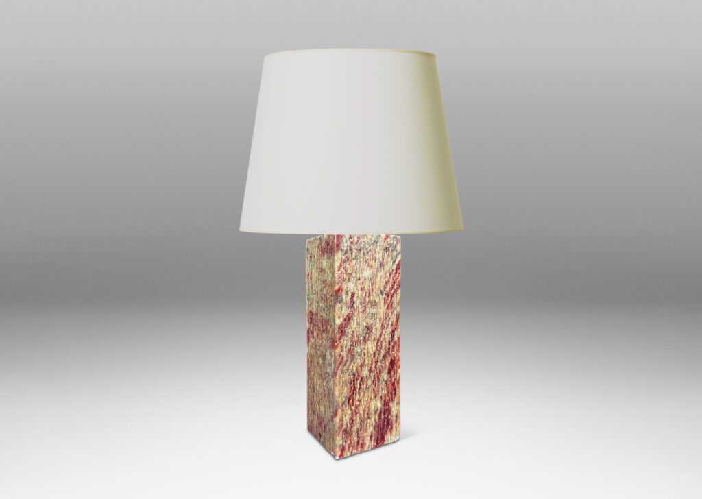 Gallery BAC square pillar forms with carved surface texture in red and gray marble, with cylindrical necks in white marble