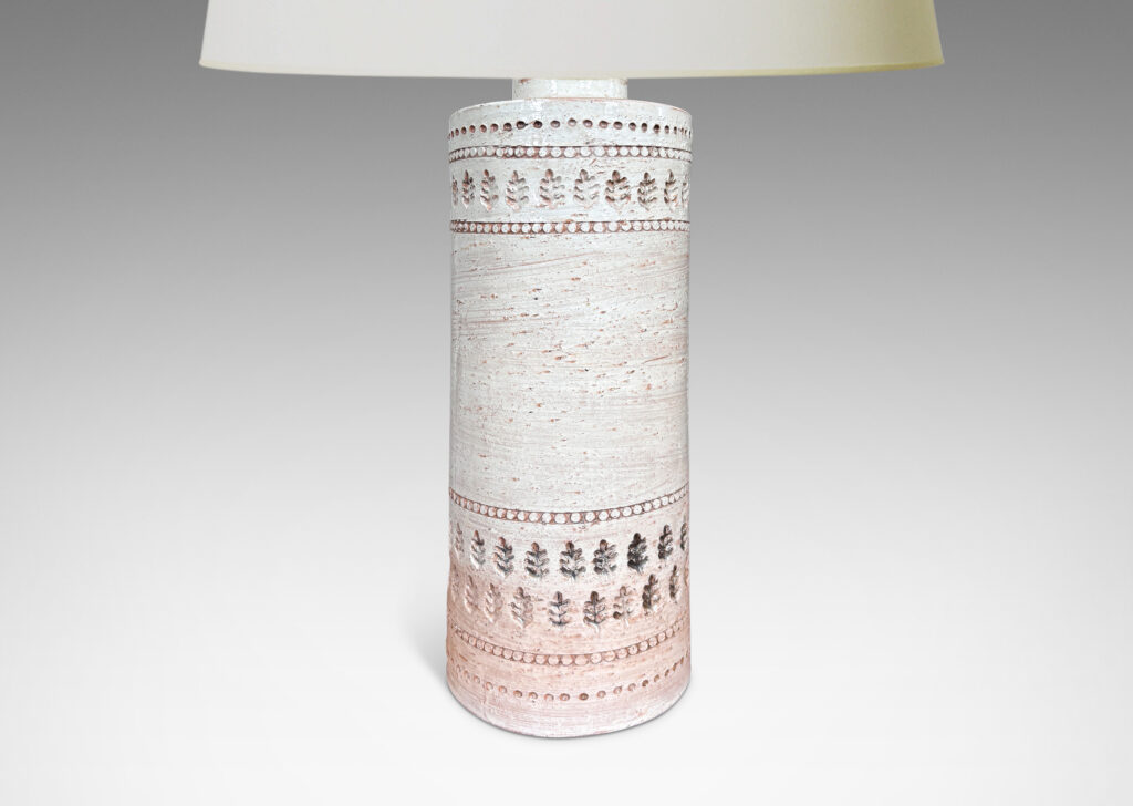 Gallery BAC textured column forms with bands of impressed dots and leaf motifs, glazed in shaded ivory