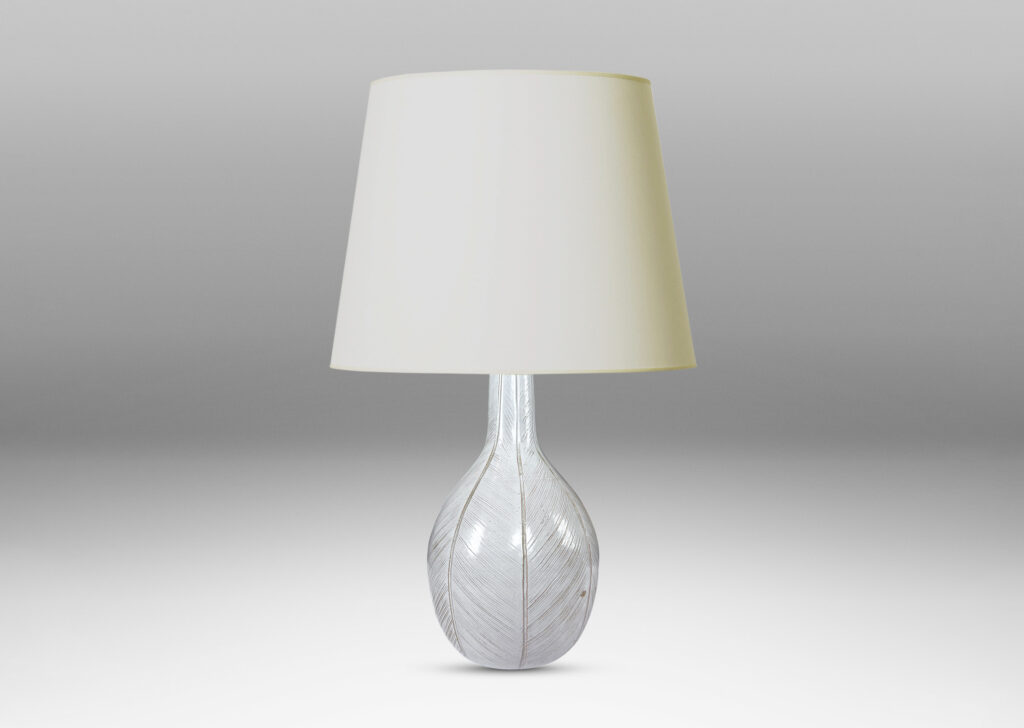 Gallery BAC gourd/drop form finished with carved meridians of herringbone textures and a semi-shiny off-white glaze