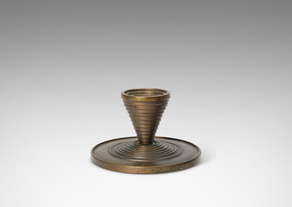 Gallery BAC stepped tapered form on stepped disk plinths; patinated bronze