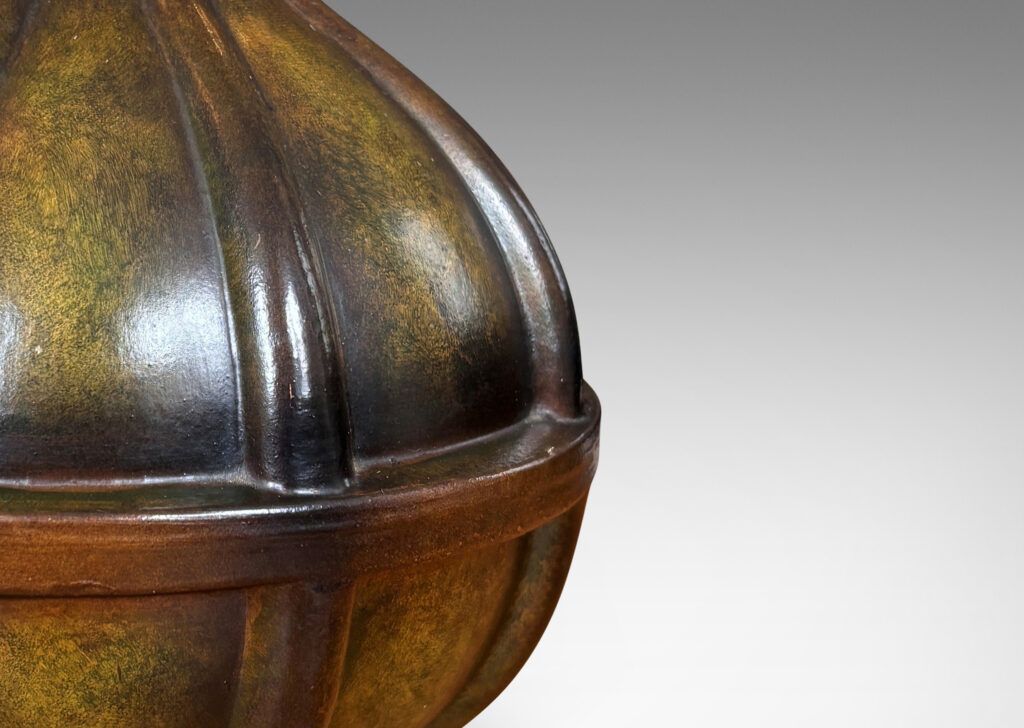 Gallery BAC globe form with sprouting top and vertical ribbing, finished in a bronze-evoking green-brown glazing