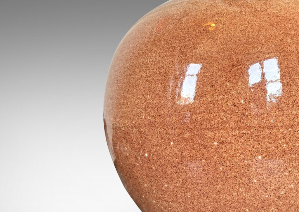 Gallery BAC globe form glazed in a stippled cinnamon over tan