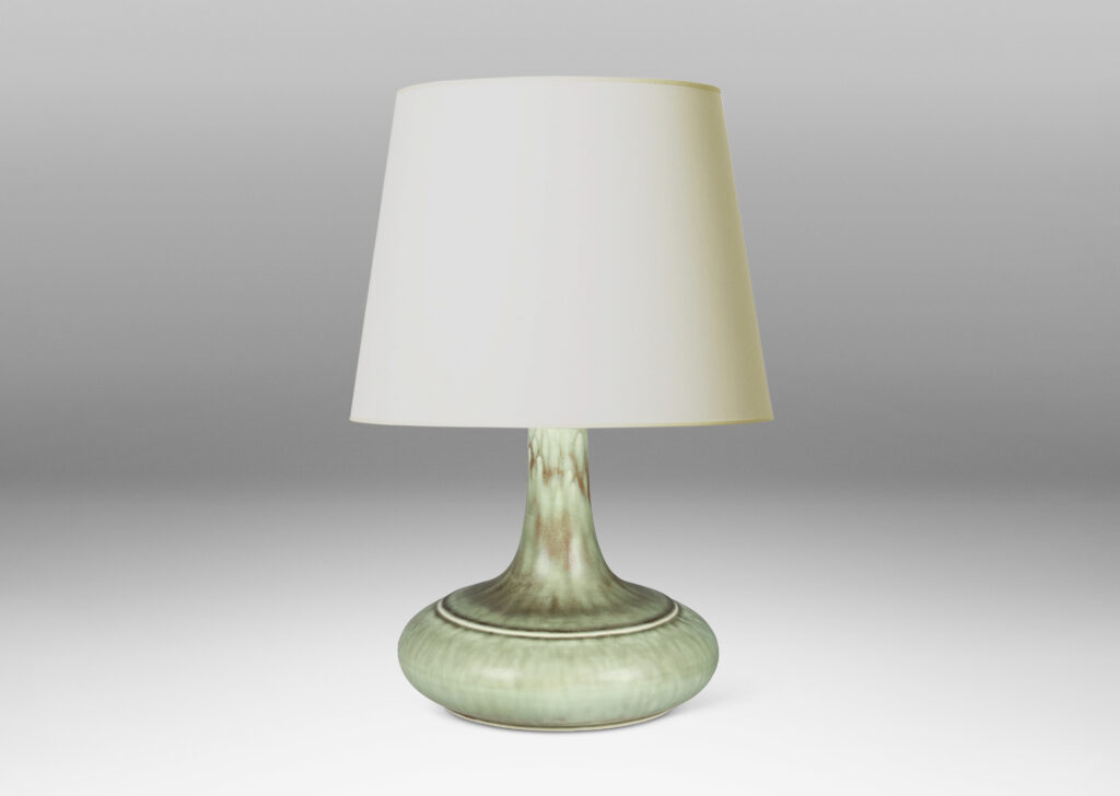 Gallery BAC decanter-like form with a wide compressed base and sprouting neck; glazed in a flowing blue-green and gray