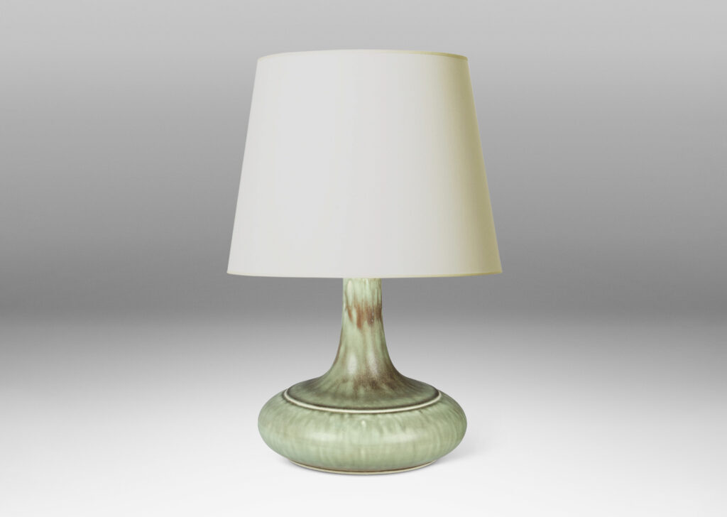 Gallery BAC decanter-like form with a wide compressed base and sprouting neck; glazed in a flowing blue-green and gray