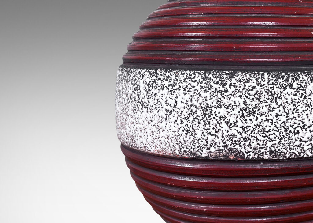 Gallery BAC globe form with crispé style white over matte brown glaze and mudcular ridged bands in red-brown