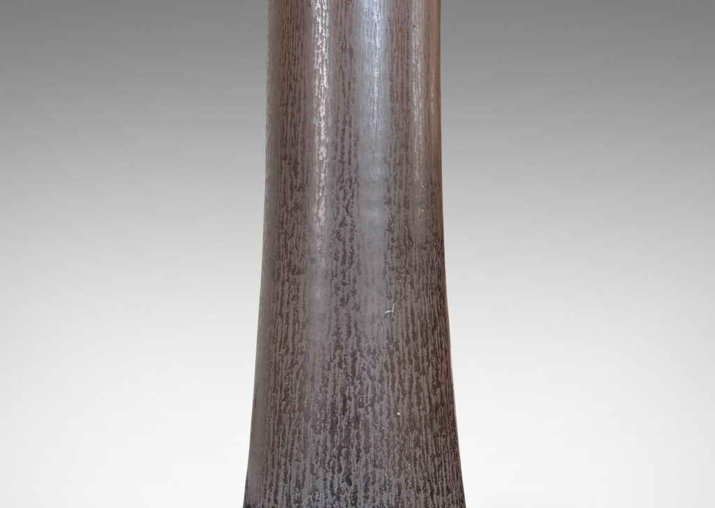 Gallery BAC coved cylindrical form on a disk plinth, finished in a handsome deep brown harefur glaze