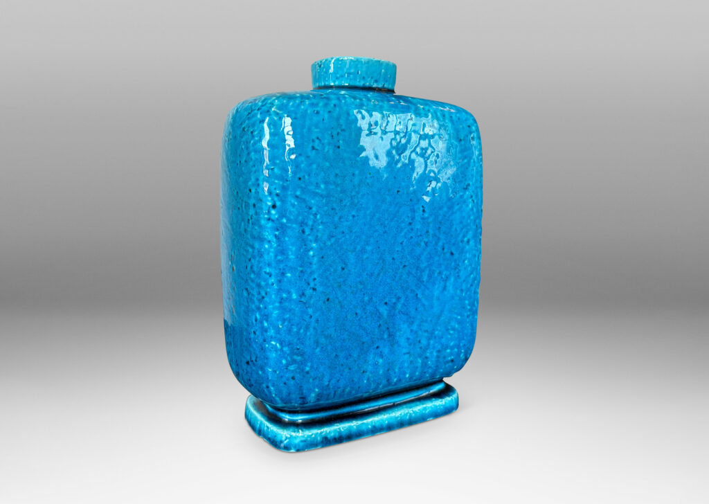 Gallery BAC on-end rectangular box form with rounded edges and a plinth base, in textured chamotte with a bright azure glaze