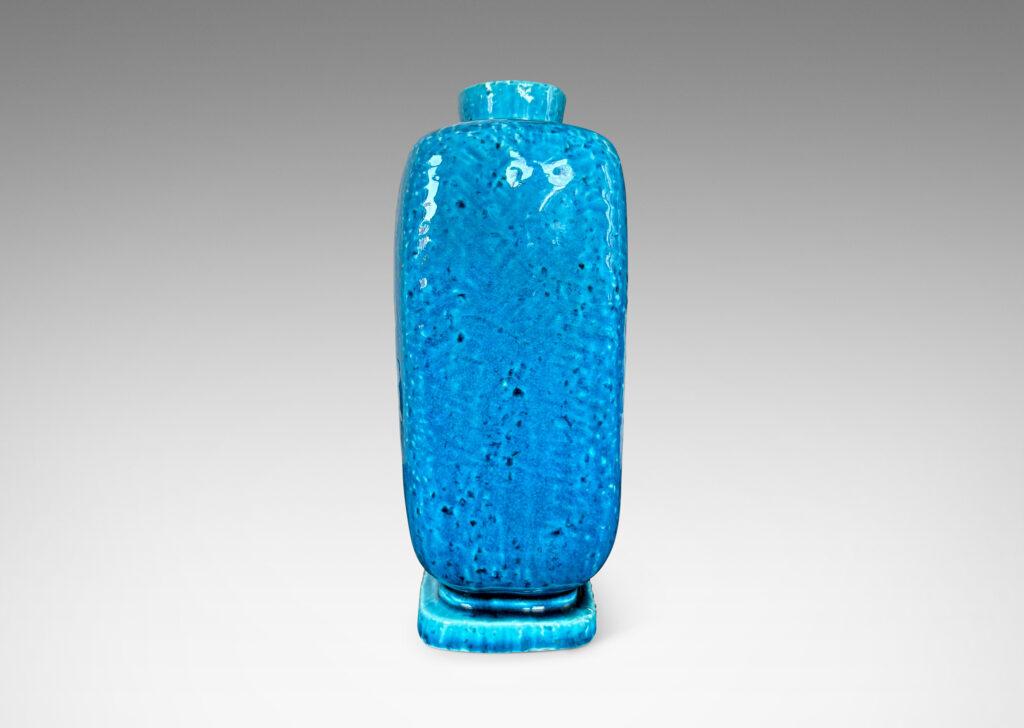 Gallery BAC on-end rectangular box form with rounded edges and a plinth base, in textured chamotte with a bright azure glaze
