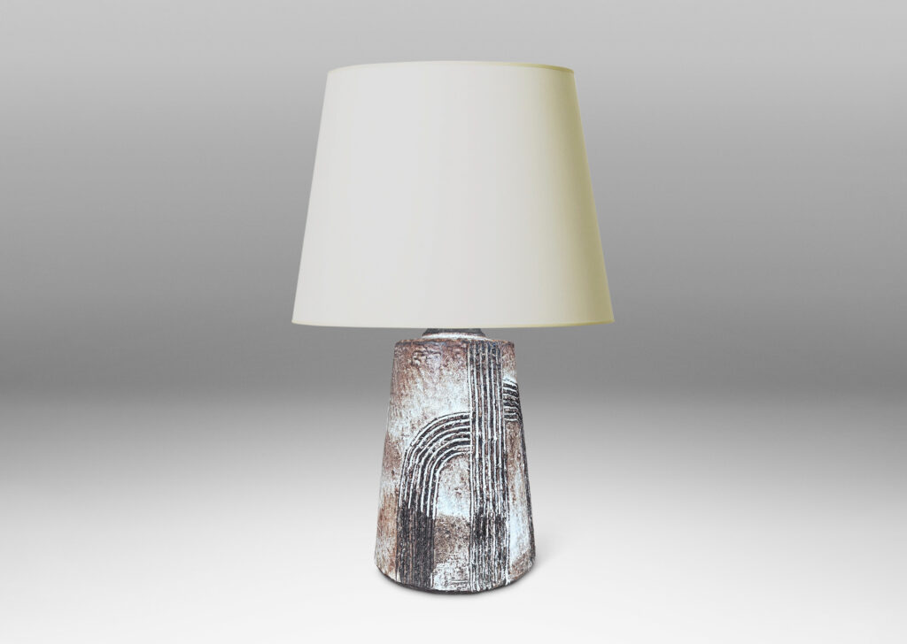Gallery BAC squared bulb form with attenuated neck and carved concentric drop design, glazed in pale gray-tan and brown