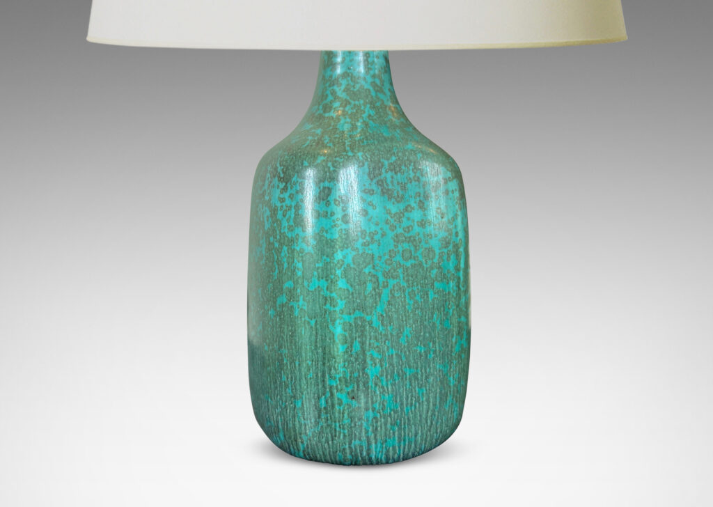 Gallery BAC squared for with rounded edges and sprouting neck, glazed in turquoise with dappled blue-green