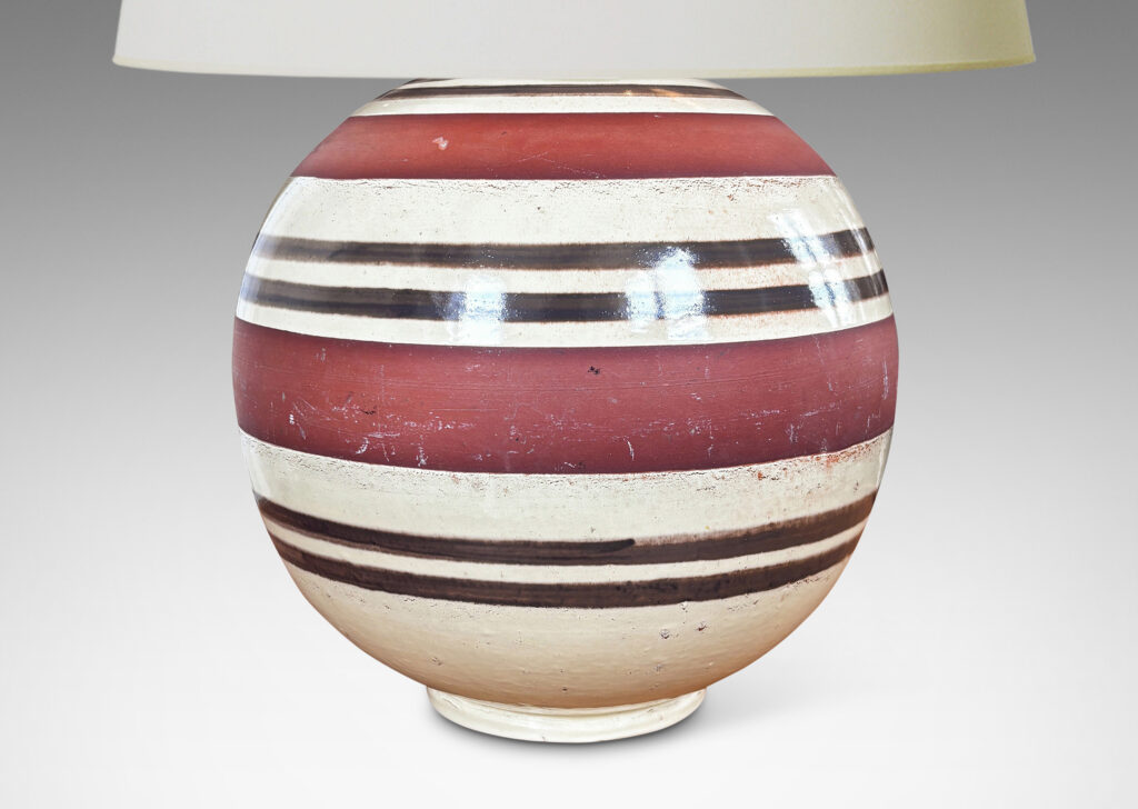 Gallery BAC spherical form partially glazed in pale tan-gray with brown stripes and broad unglazed bands