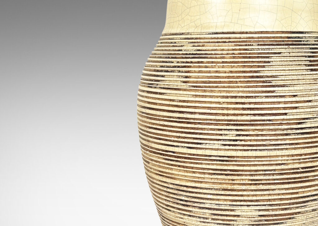 Gallery BAC undulating ginger jar form with carved ribbed texture and eggshell craquel ivory glaze