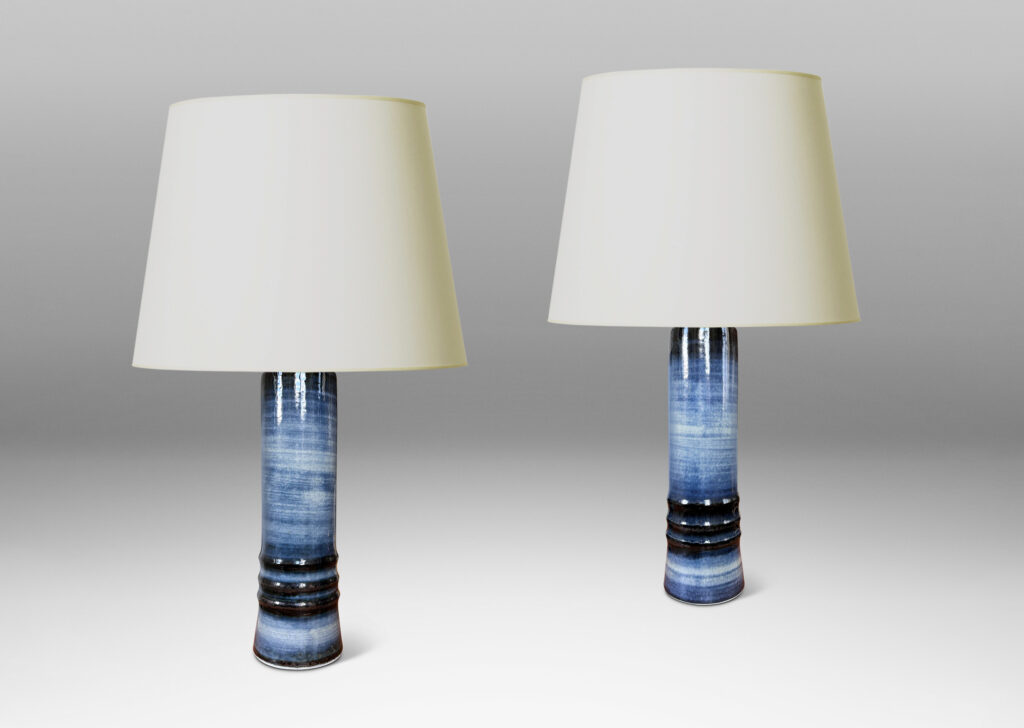 Gallery BAC cylindrical forms articulated with raised rings and glazed with graduations of blue tones