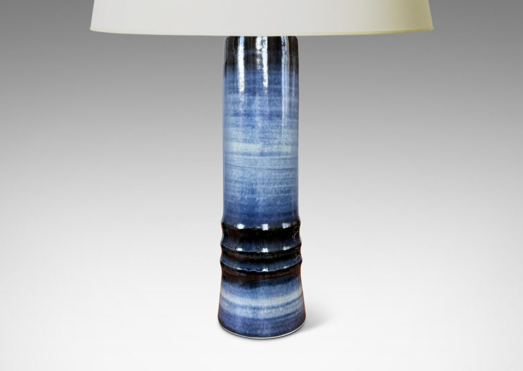 Gallery BAC cylindrical forms articulated with raised rings and glazed with graduations of blue tones