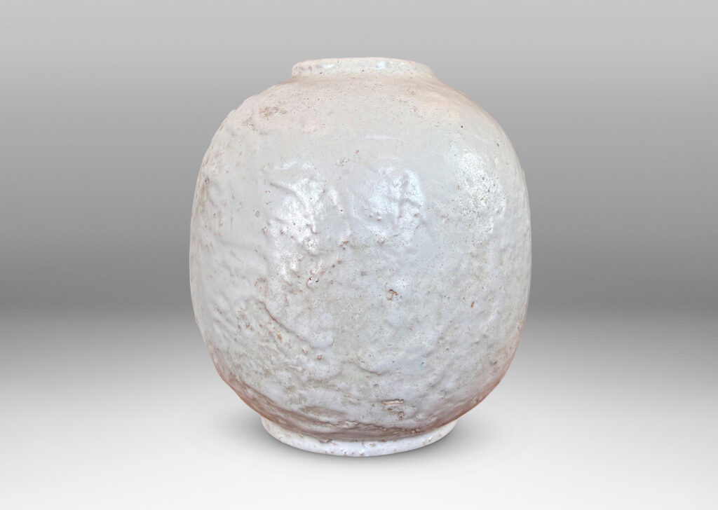 Gallery BAC ovoid globe form with textured finish, glazed in an eggshell finish pale gray