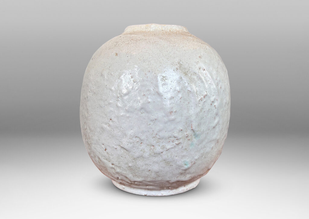 Gallery BAC ovoid globe form with textured finish, glazed in an eggshell finish pale gray