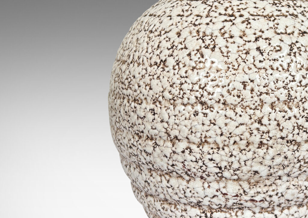 Gallery BAC ridged and tapered balloon-like form glazed in a shiny ivory white “crispé” over matte brown
