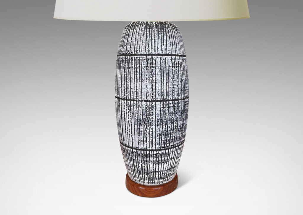 Gallery BAC swelling column form glazed in wide bands of vertical lines of white-dark purple against matte brown