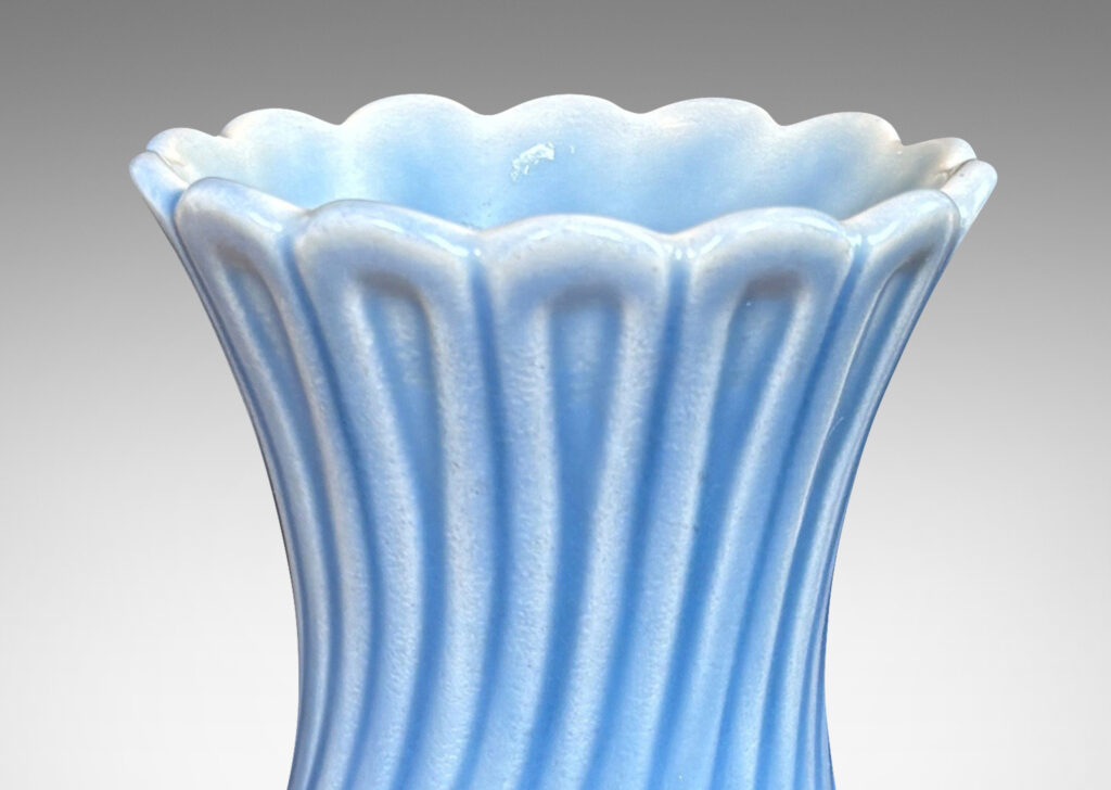 Gallery BAC swelling forms with swirled reeding and scalloped mouths, glazed in an eggshell finish light blue