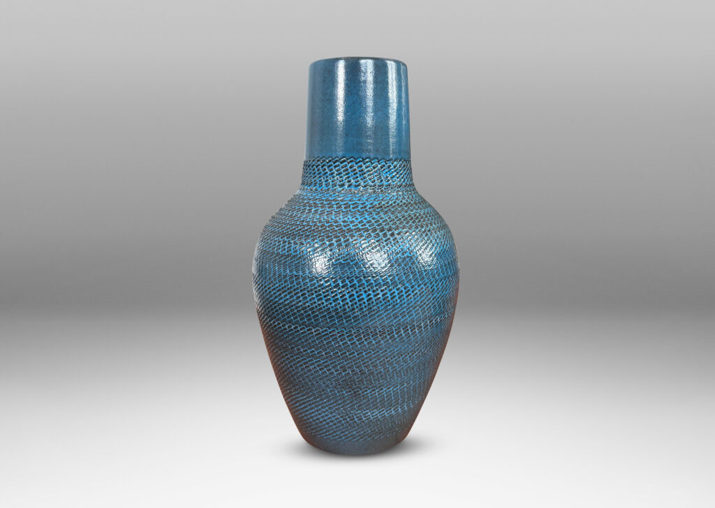 Gallery BAC tapered forms with wide necks and zig-zag texture, glazed in a light gray-blue with gray striae