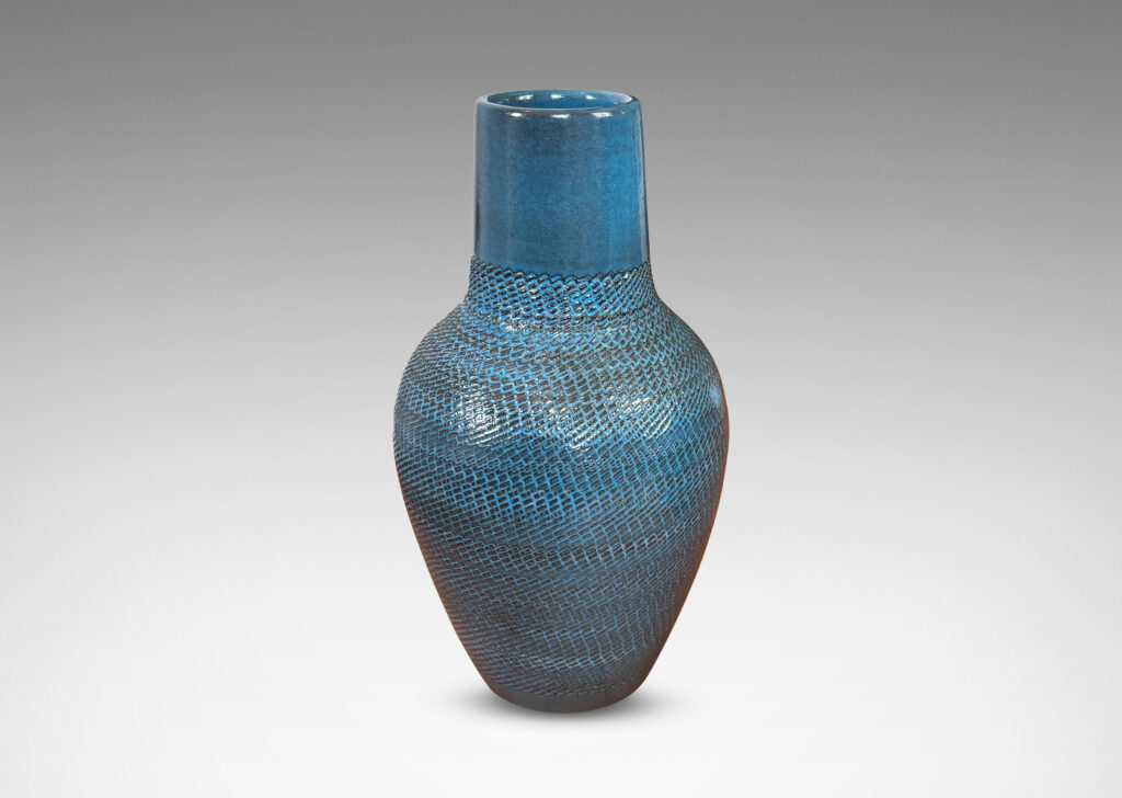 Gallery BAC tapered forms with wide necks and zig-zag texture, glazed in a light gray-blue with gray striae