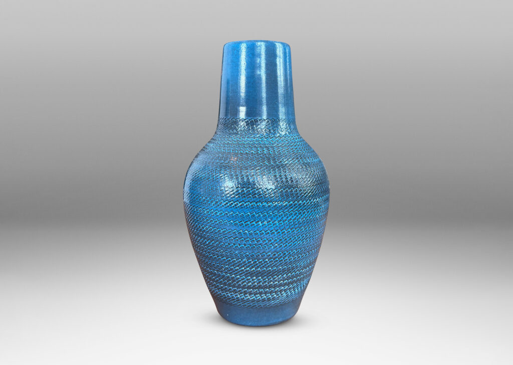 Gallery BAC tapered forms with wide necks and zig-zag texture, glazed in a light gray-blue with gray striae