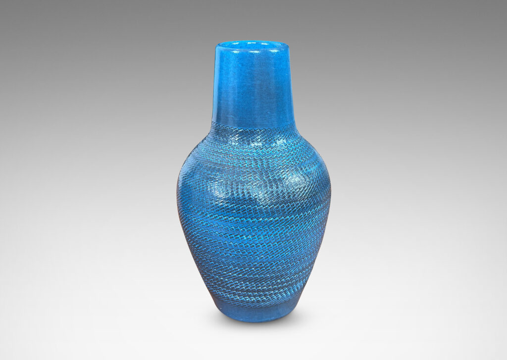 Gallery BAC tapered forms with wide necks and zig-zag texture, glazed in a light gray-blue with gray striae