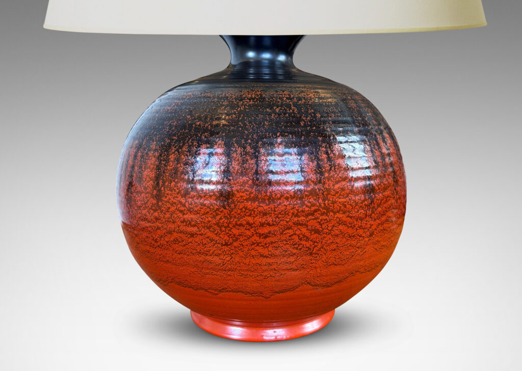 Gallery BAC large ridged plump globe form glazed orange overglazed on top with gunmetal gray