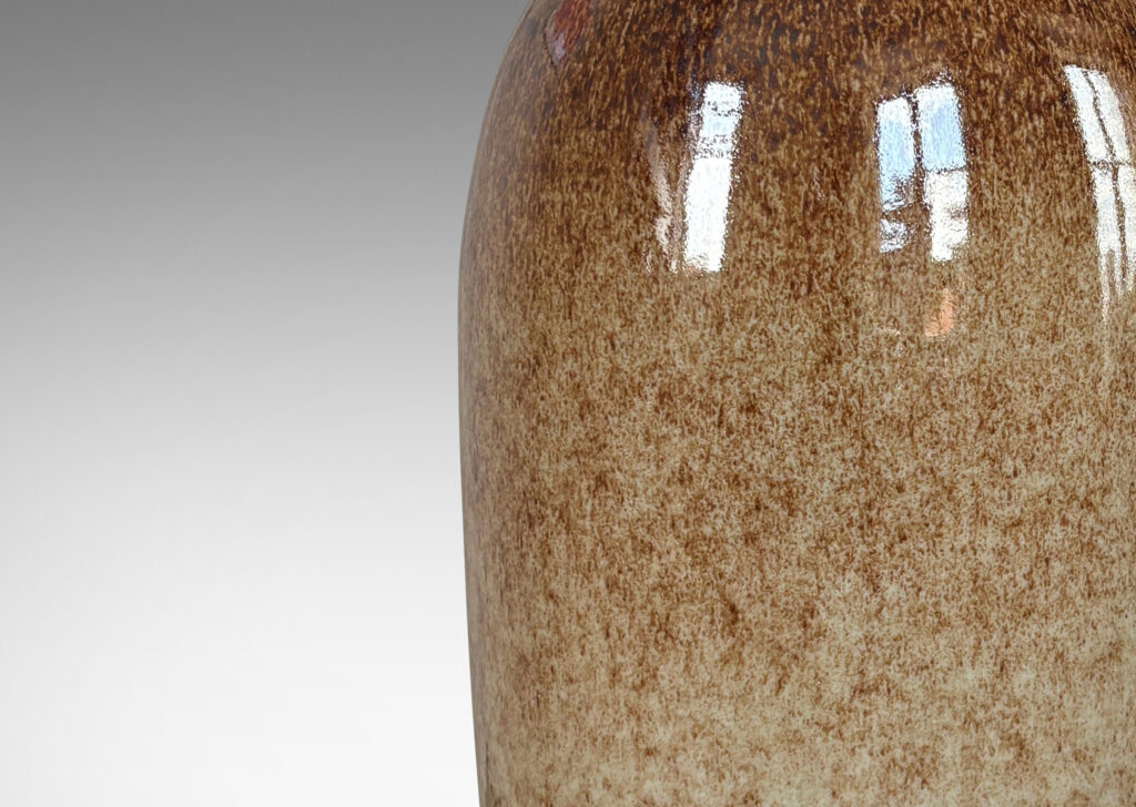 Gallery BAC tall tapered vase form glazed in a textured brown on pale sandy taupe