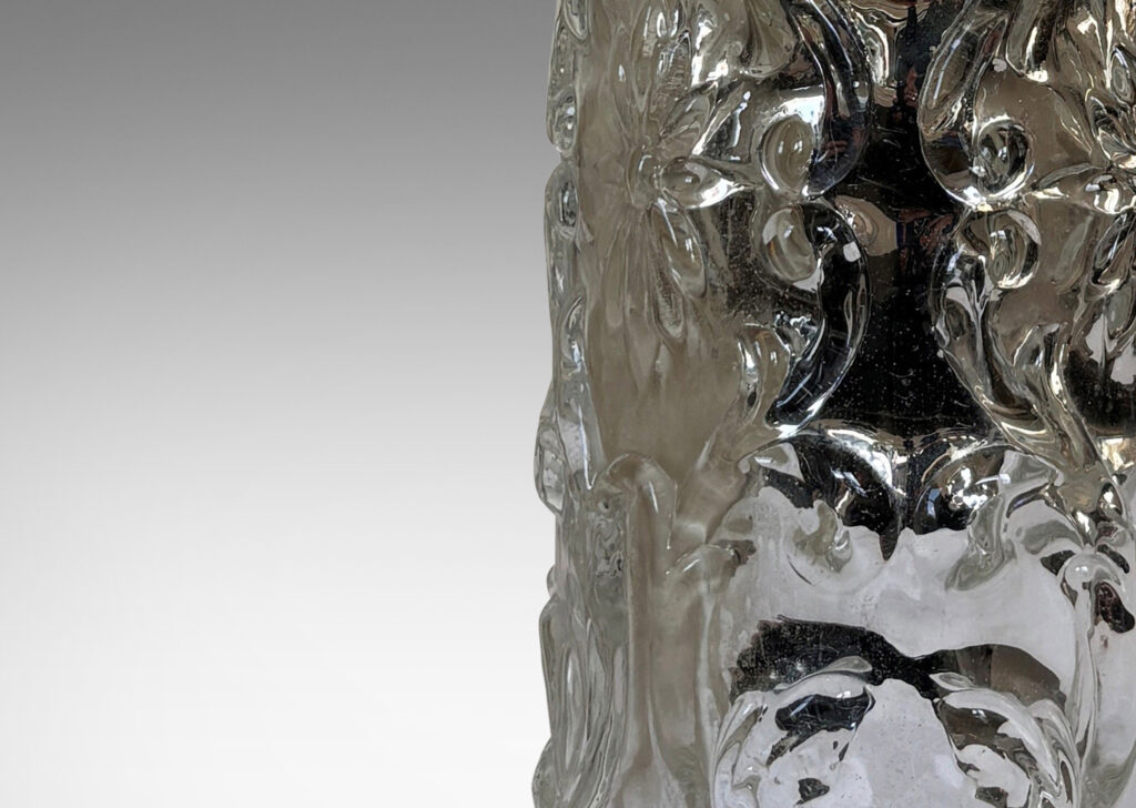 Gallery BAC mold-blown base with cylindrical form and baroque style scrolling reliefs, silver mirrored glass