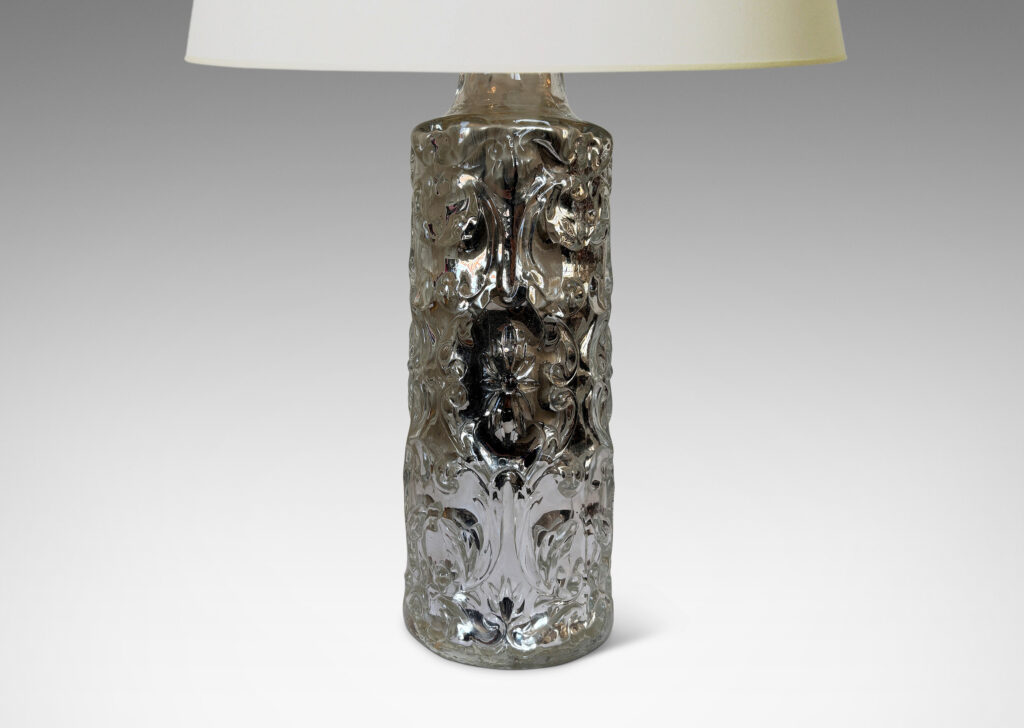 Gallery BAC mold-blown base with cylindrical form and baroque style scrolling reliefs, silver mirrored glass