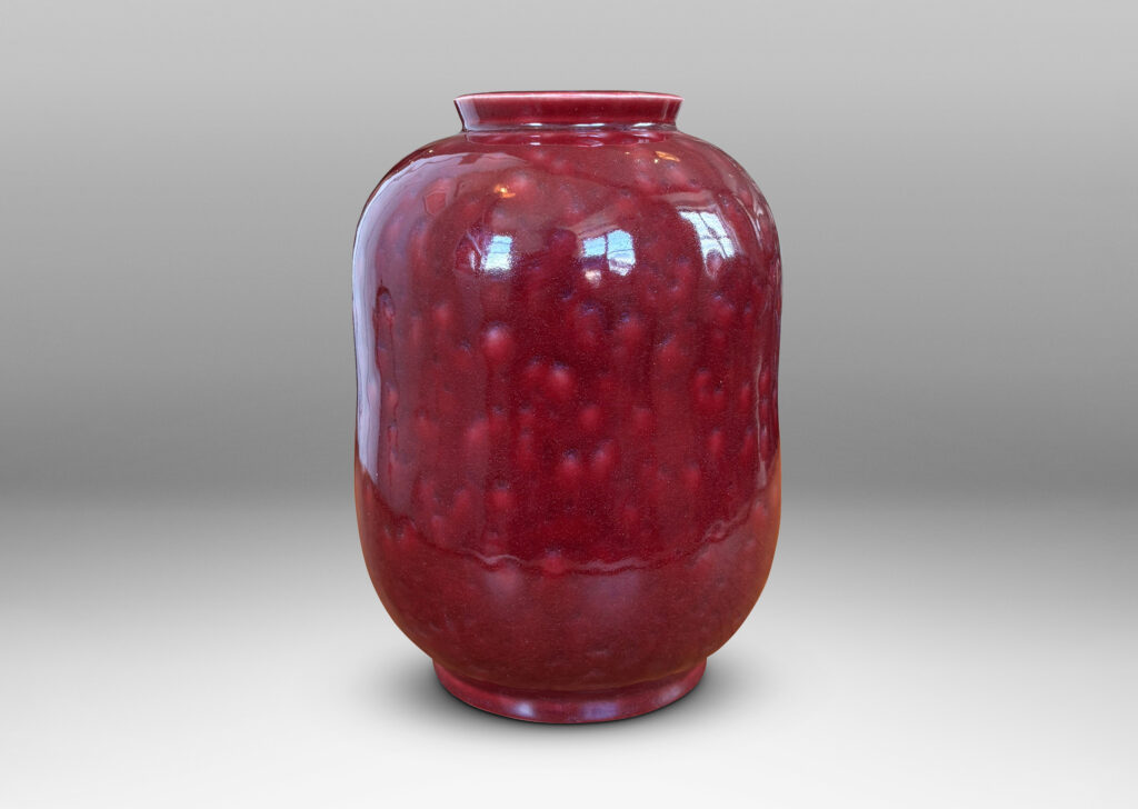 Gallery BAC cinched ovoid form with wide mouth and reveal; glazed in a saturated oxblood burgundy