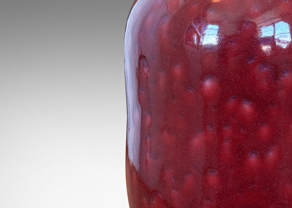 Gallery BAC cinched ovoid form with wide mouth and reveal; glazed in a saturated oxblood burgundy