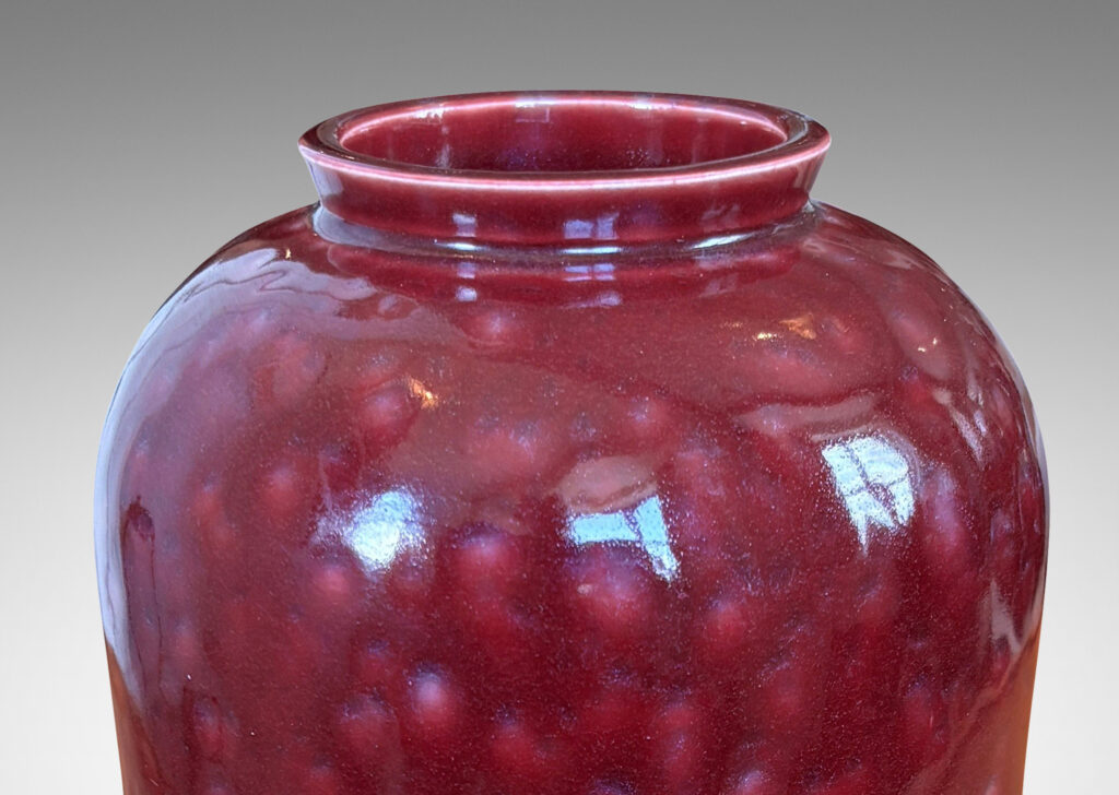 Gallery BAC cinched ovoid form with wide mouth and reveal; glazed in a saturated oxblood burgundy