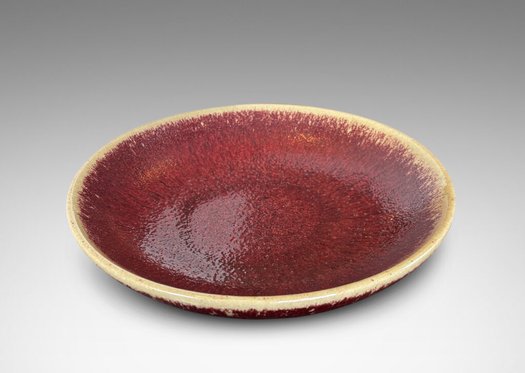 Gallery BAC low wide form glazed in oxblood burgundy with pale gray edge