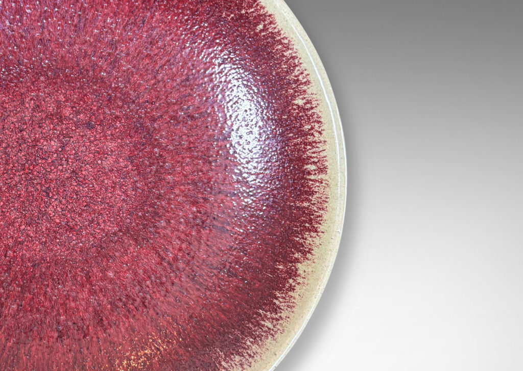 Gallery BAC low wide form glazed in oxblood burgundy with pale gray edges
