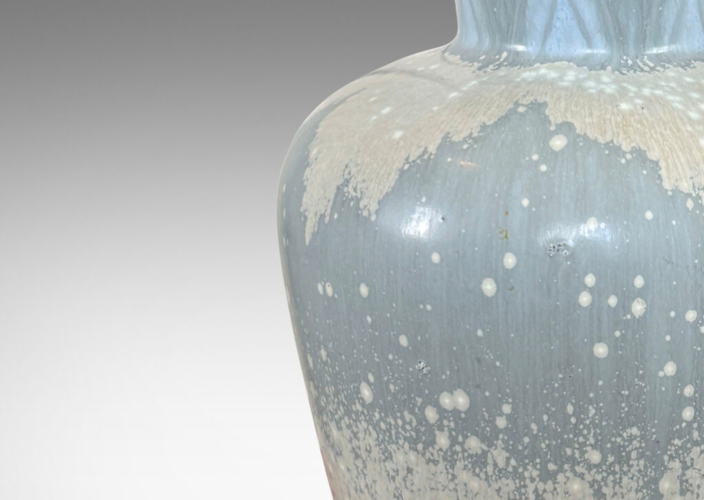 Gallery BAC tapered forms with flared necks carved with an Egyptian style chevron pattern, glazed in dappled paled grayish blue