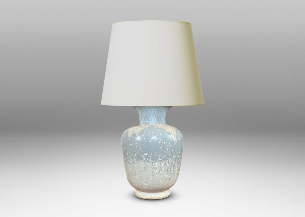 Gallery BAC tapered forms with flared necks carved with an Egyptian style chevron pattern, glazed in dappled paled grayish blue