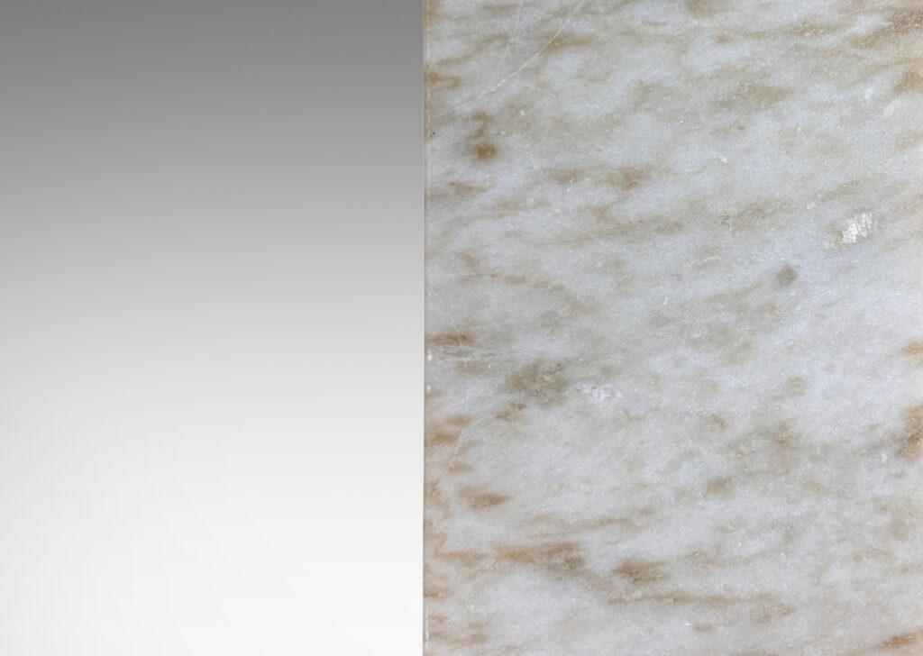 Gallery BAC on-end box forms in pale gray and light brown stone; marble