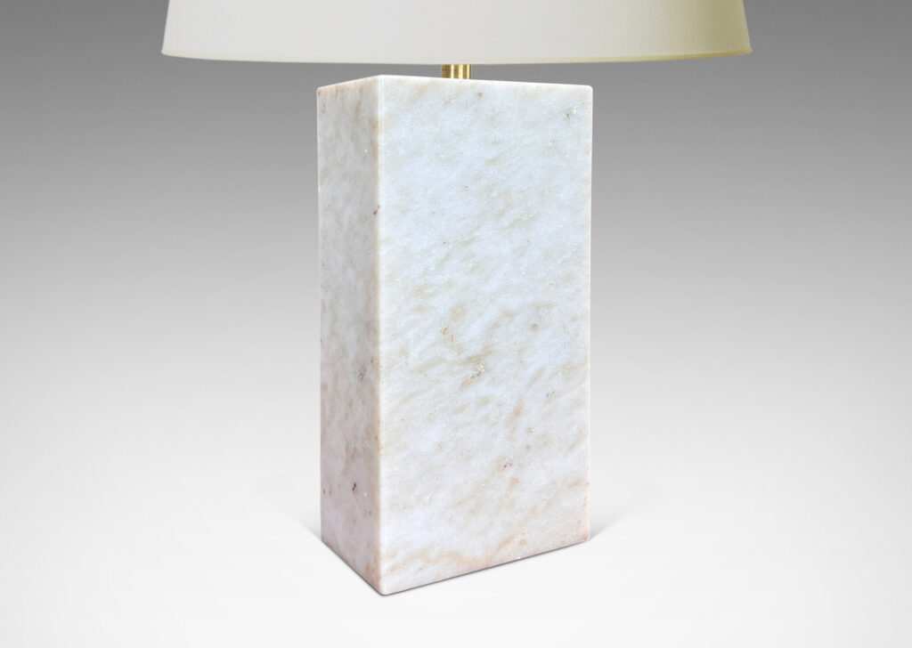 Gallery BAC on-end box forms in pale gray and light brown stone; marble