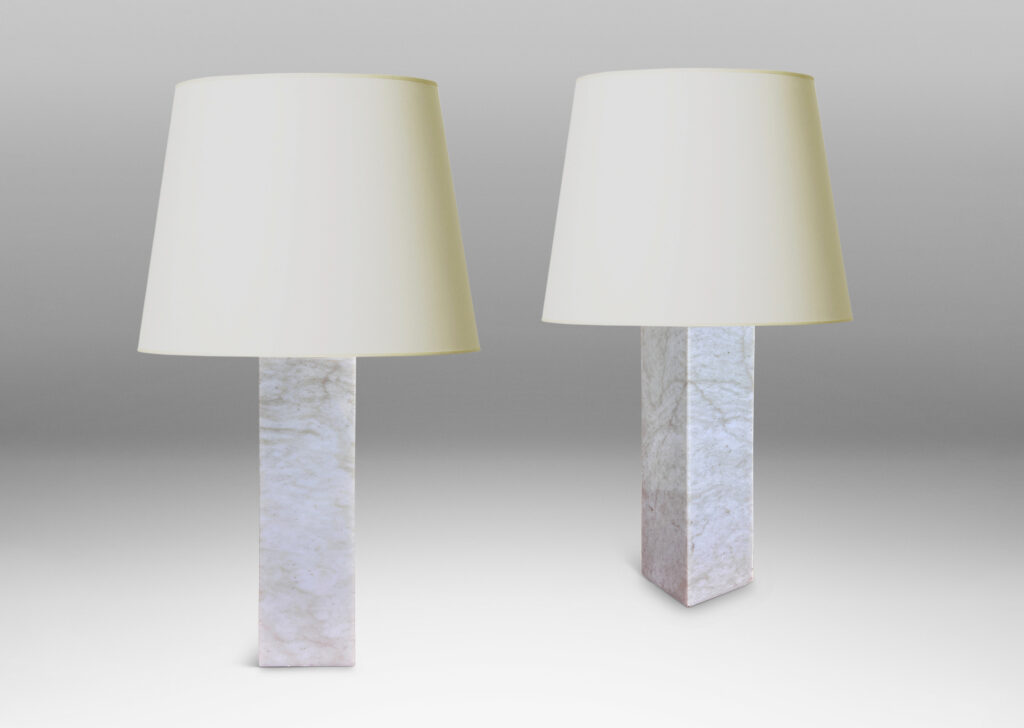 Gallery BAC square pillar forms in pale gray and light brown stone; marble