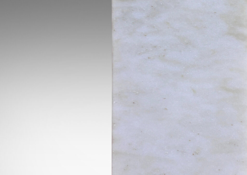 Gallery BAC square pillar forms in pale gray and light brown stone; marble