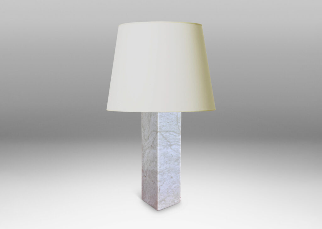 Gallery BAC square pillar forms in pale gray and light brown stone; marble